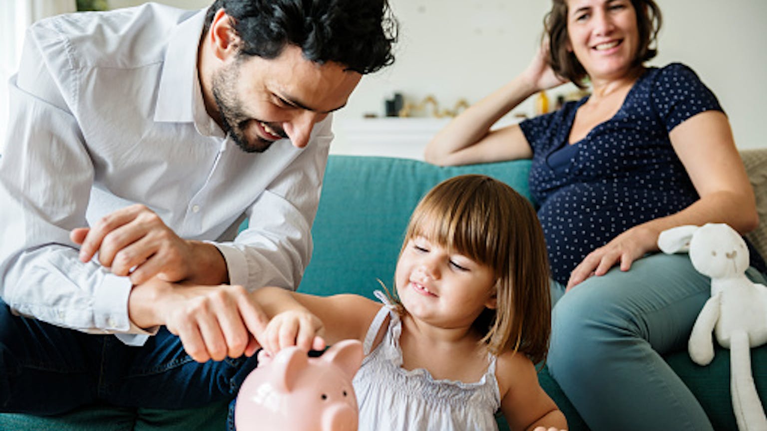 Family teaching their kids financial education