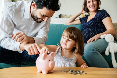 Family teaching their kids financial education